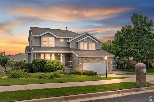 497 E 3525 N, North Ogden, UT 84414 - traditional-style home with an attached garage, driveway, a lawn, brick siding, and roof with shingles