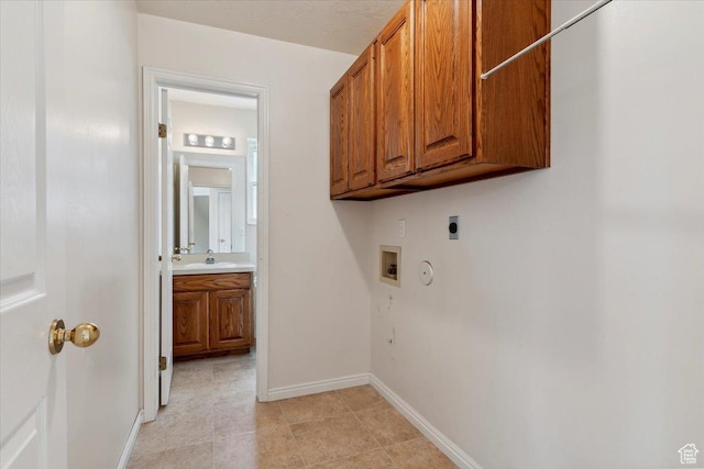 497 E 3525 N, North Ogden, UT 84414 - laundry room featuring electric dryer hookup, cabinet space, hookup for a washing machine, gas dryer hookup, and baseboards
