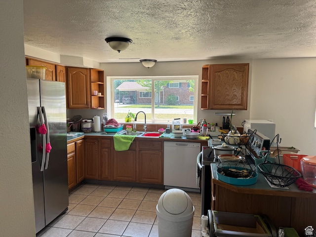 1102 W 860 N, Provo, UT 84604 - kitchen with stainless steel fridge, open shelves, dishwasher, brown cabinets, and a textured ceiling