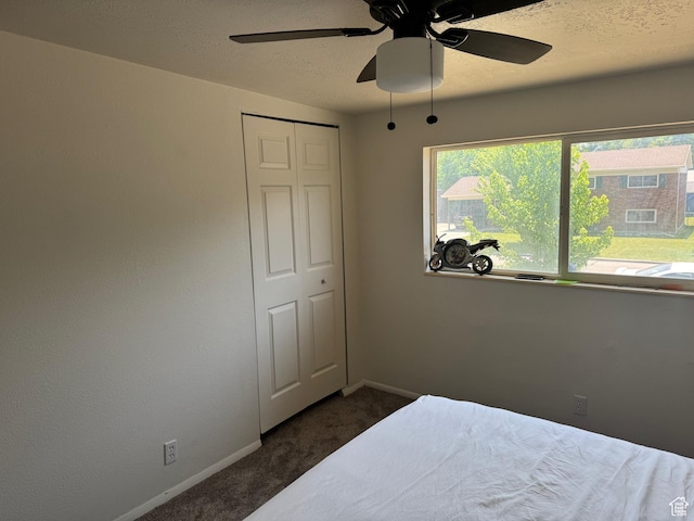 1102 W 860 N, Provo, UT 84604 - bedroom with dark carpet, a ceiling fan, and a textured ceiling