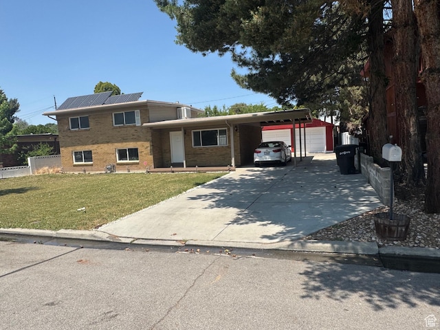 1102 W 860 N, Provo, UT 84604 - tri-level home featuring a carport, a front lawn, brick siding, roof mounted solar panels, and driveway