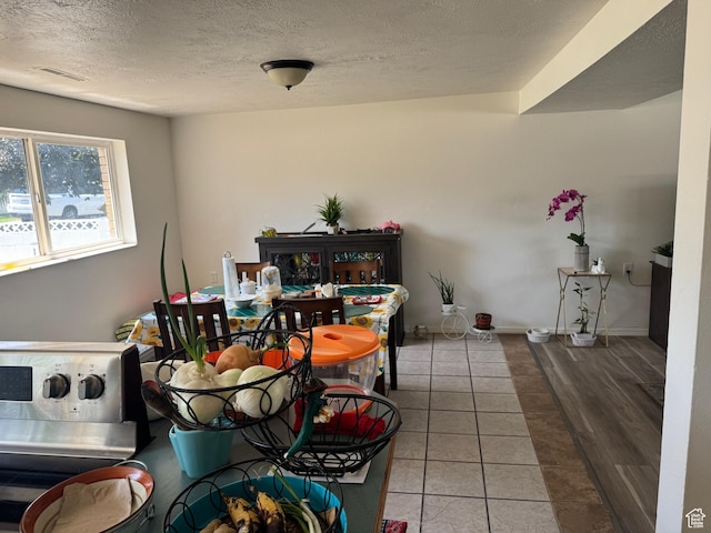 1102 W 860 N, Provo, UT 84604 - tiled dining room with a textured ceiling