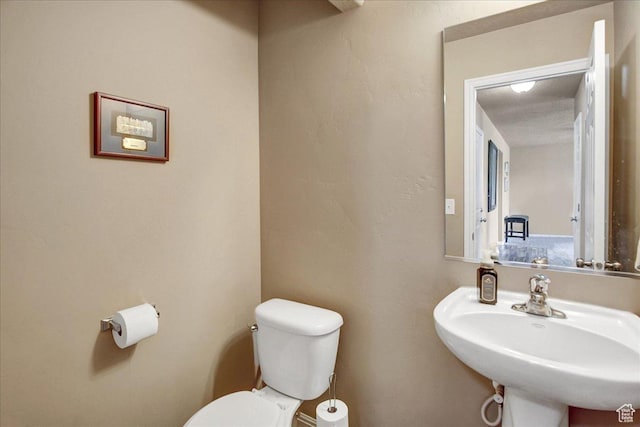 2118 W Foxwood St, West Haven, UT 84401 - half bathroom featuring toilet and a sink
