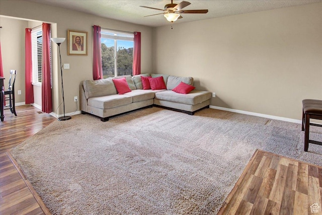 2118 W Foxwood St, West Haven, UT 84401 - living room with a ceiling fan, baseboards, and wood finished floors