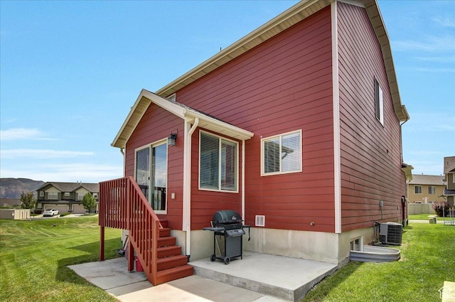 2118 W Foxwood St, West Haven, UT 84401 - view of side of home with a yard, central AC unit, and a patio area