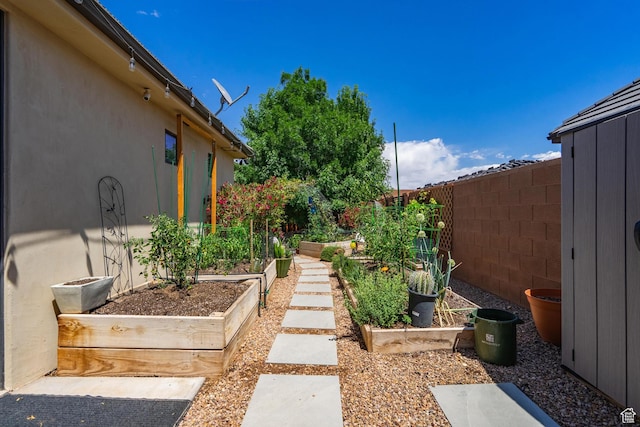 2573 S 3160 E, St George, UT 84790 - view of yard featuring a garden