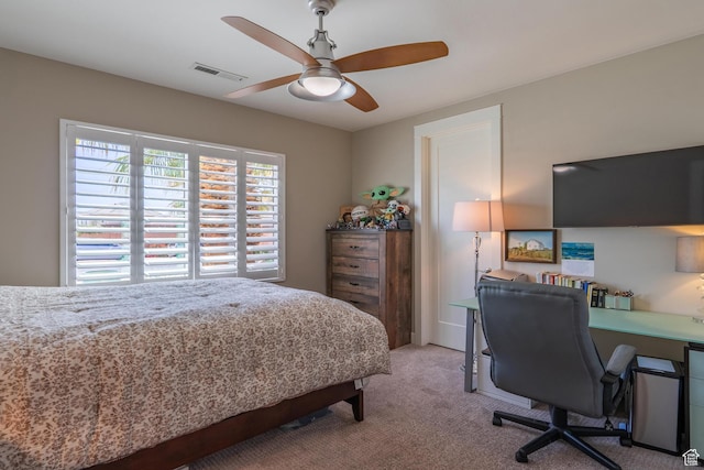 2573 S 3160 E, St George, UT 84790 - bedroom featuring light colored carpet, a desk, and ceiling fan