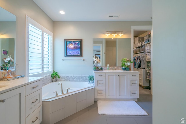 2573 S 3160 E, St George, UT 84790 - full bathroom with two vanities, tile patterned floors, a garden tub, and a spacious closet