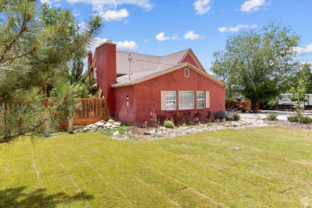125 W 300 S, Ephraim, UT 84627 - view of side of property with a chimney and brick siding