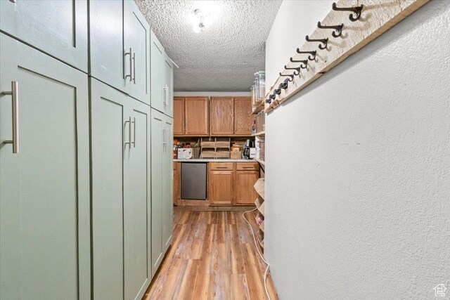 125 W 300 S, Ephraim, UT 84627 - bar with a textured wall, a textured ceiling, and light wood-style floors