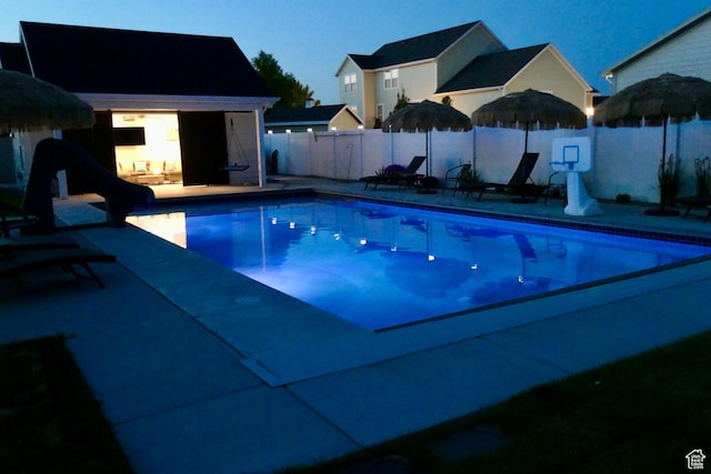 207 S Summer Breeze Ln, Layton, UT 84041 - view of pool with a fenced backyard, a patio area, and a water slide