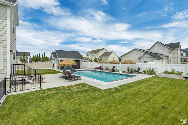 207 S Summer Breeze Ln, Layton, UT 84041 - view of swimming pool with a residential view, a patio, an outdoor structure, and a storage structure