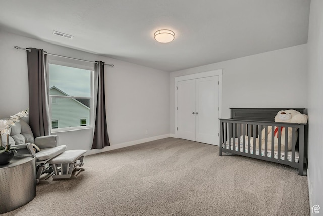 207 S Summer Breeze Ln, Layton, UT 84041 - bedroom with carpet floors, baseboards, a closet, and a nursery area