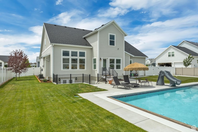 207 S Summer Breeze Ln, Layton, UT 84041 - rear view of property featuring a patio, roof with shingles, entry steps, and central AC unit