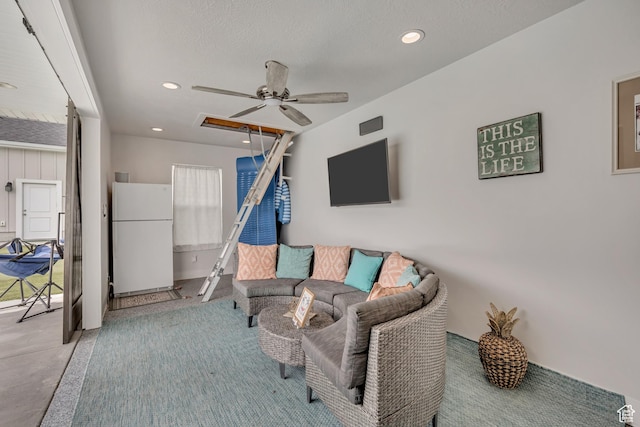 207 S Summer Breeze Ln, Layton, UT 84041 - living room featuring ceiling fan, finished concrete flooring, and recessed lighting