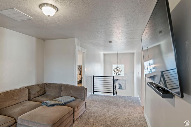 4827 N Sage Dr, Eagle Mountain, UT 84005 - carpeted living room featuring a chandelier and a textured ceiling