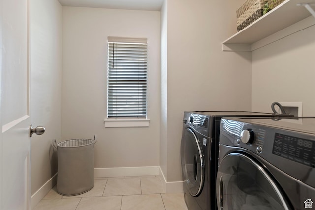 4827 N Sage Dr, Eagle Mountain, UT 84005 - washroom featuring washer and clothes dryer, baseboards, and light tile patterned floors