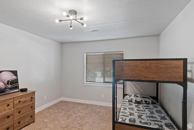 4827 N Sage Dr, Eagle Mountain, UT 84005 - bedroom featuring light carpet, baseboards, a chandelier, and a textured ceiling