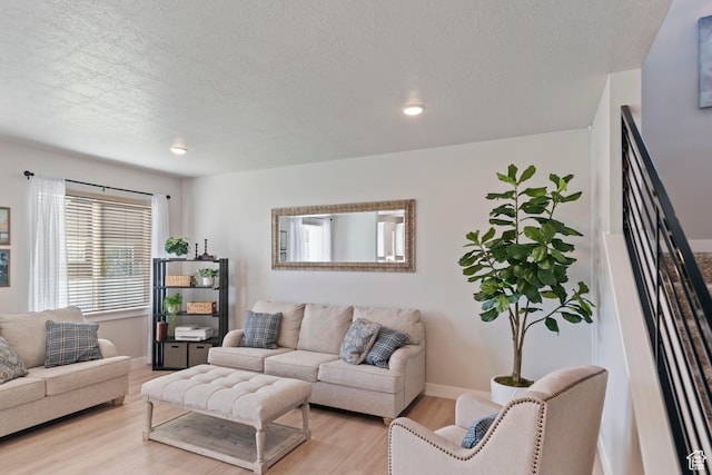 4827 N Sage Dr, Eagle Mountain, UT 84005 - living room featuring wood finished floors, a textured ceiling, baseboards, and recessed lighting