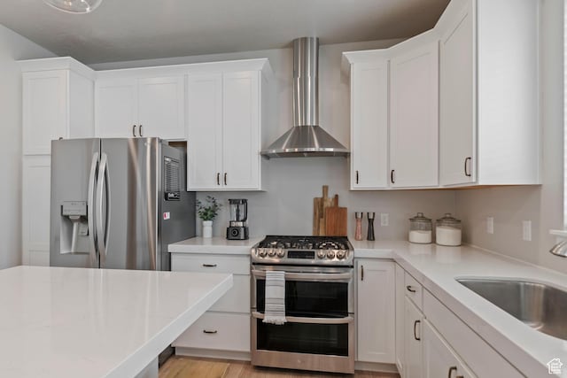 4827 N Sage Dr, Eagle Mountain, UT 84005 - kitchen with stainless steel appliances, wall chimney range hood, white cabinets, and a sink