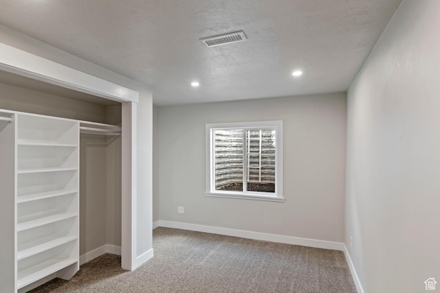 4827 N Sage Dr, Eagle Mountain, UT 84005 - unfurnished bedroom featuring carpet, baseboards, recessed lighting, a textured ceiling, and a closet