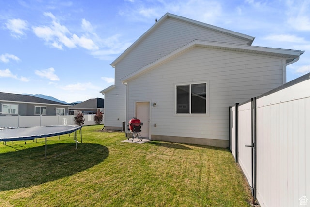 4827 N Sage Dr, Eagle Mountain, UT 84005 - back of house with a trampoline