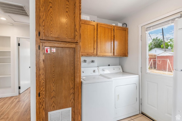 425 W 600 N, Orem, UT 84057 - laundry room with cabinet space, independent washer and dryer, and light wood-style floors
