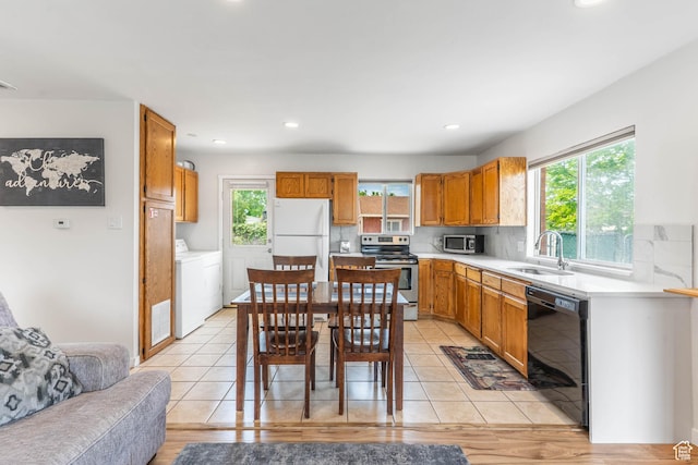 425 W 600 N, Orem, UT 84057 - kitchen featuring stainless steel appliances, a sink, healthy amount of natural light, light countertops, and recessed lighting