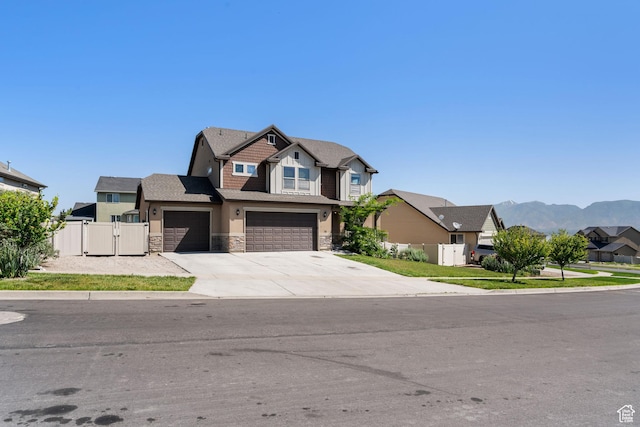 78 W Wildflower Dr, Saratoga Springs, UT 84045 - craftsman-style house featuring a gate, stone siding, driveway, a garage, and a residential view