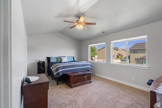 78 W Wildflower Dr, Saratoga Springs, UT 84045 - bedroom with carpet, baseboards, vaulted ceiling, a textured ceiling, and a ceiling fan