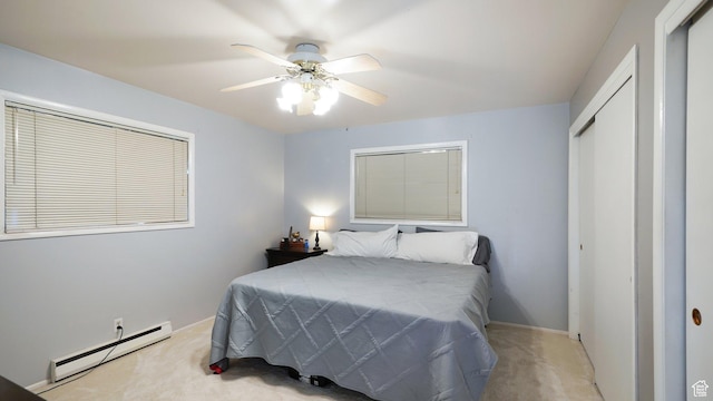 143 E 100 N, Gunnison, UT 84634 - carpeted bedroom with a baseboard heating unit, a closet, baseboards, and ceiling fan
