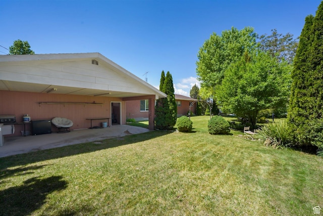 143 E 100 N, Gunnison, UT 84634 - view of grassy yard featuring a patio