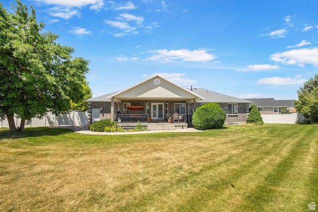 1202 N 2155 W, Clinton, UT 84015 - back of property featuring brick siding and covered porch