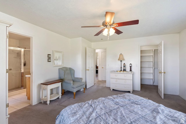 1202 N 2155 W, Clinton, UT 84015 - carpeted bedroom featuring connected bathroom and a ceiling fan