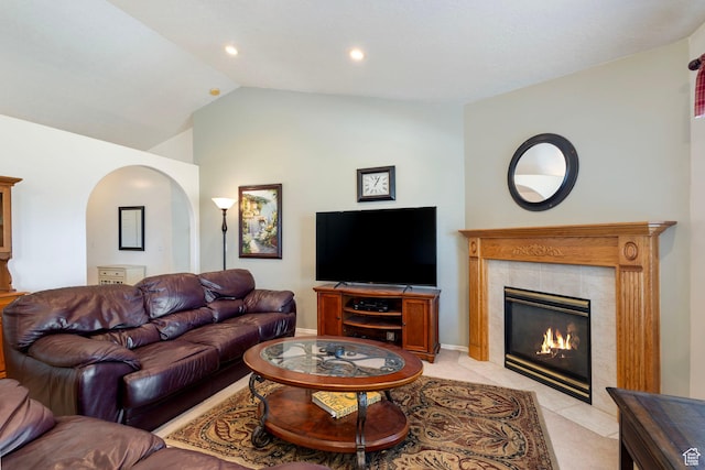 1202 N 2155 W, Clinton, UT 84015 - living area with lofted ceiling, arched walkways, a fireplace, and recessed lighting