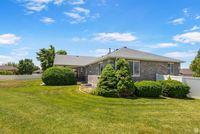 1202 N 2155 W, Clinton, UT 84015 - view of property exterior featuring brick siding and a shingled roof
