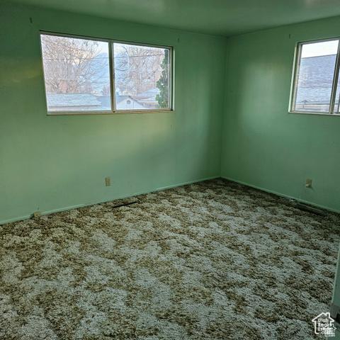 385 E 300 N, Spanish Fork, UT 84660 - unfurnished room with healthy amount of natural light and carpet