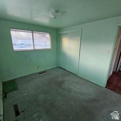 385 E 300 N, Spanish Fork, UT 84660 - unfurnished bedroom featuring carpet floors and a closet