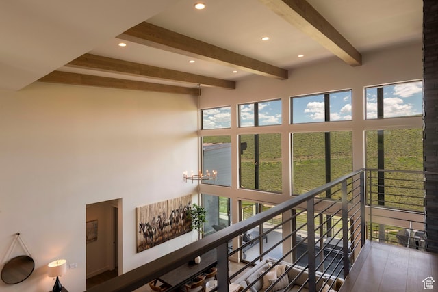 6650 Golden Bear Loop, Park City, UT 84098 - sunroom / solarium featuring beamed ceiling, a chandelier, and healthy amount of natural light