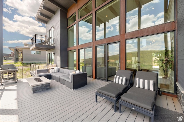 6650 Golden Bear Loop, Park City, UT 84098 - wooden deck featuring area for grilling and an outdoor living space with a fire pit