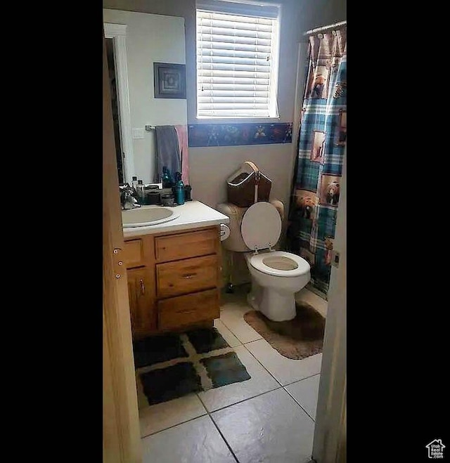 1559 S 2950 W, Vernal, UT 84078 - bathroom with tile patterned floors, vanity, toilet, and a shower with shower curtain
