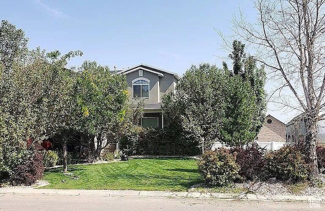 1559 S 2950 W, Vernal, UT 84078 - obstructed view of property with a front lawn and stucco siding