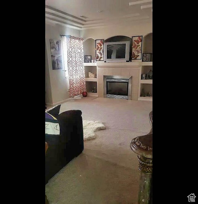 1559 S 2950 W, Vernal, UT 84078 - carpeted living room with crown molding and a tile fireplace