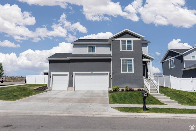 7709 N Seabiscuit Rd, Eagle Mountain, UT 84005 - traditional-style house featuring an attached garage, stucco siding, driveway, and stairs