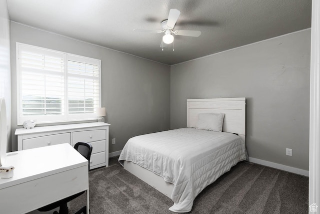 7709 N Seabiscuit Rd, Eagle Mountain, UT 84005 - bedroom with dark carpet, baseboards, and ceiling fan