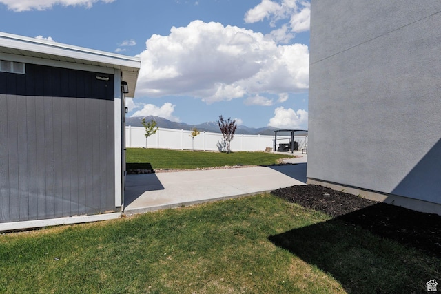 7709 N Seabiscuit Rd, Eagle Mountain, UT 84005 - view of yard featuring a patio area and a mountain view