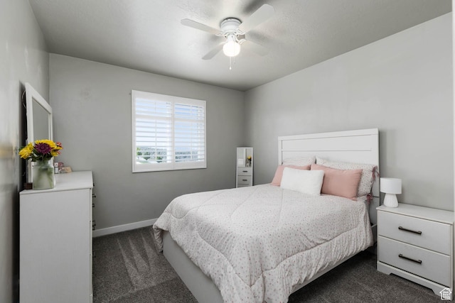7709 N Seabiscuit Rd, Eagle Mountain, UT 84005 - bedroom featuring dark colored carpet, baseboards, and ceiling fan