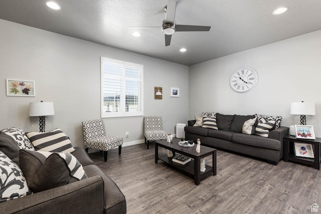 7709 N Seabiscuit Rd, Eagle Mountain, UT 84005 - living room featuring wood finished floors, recessed lighting, a ceiling fan, and baseboards