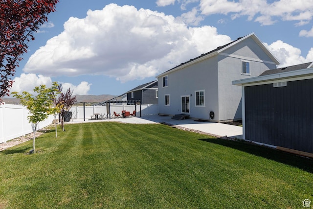 7709 N Seabiscuit Rd, Eagle Mountain, UT 84005 - rear view of house with a patio area and stucco siding