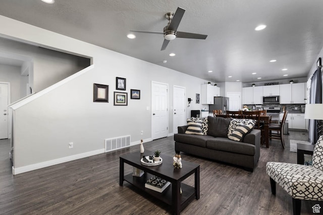 7709 N Seabiscuit Rd, Eagle Mountain, UT 84005 - living area with a ceiling fan, dark wood finished floors, recessed lighting, and baseboards